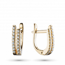 Keltakultainen korvakoru timanttikoru