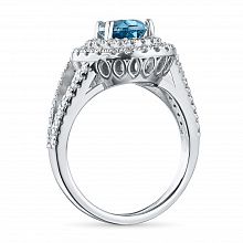 Sormus timanttikoru ja topaasin kanssa