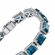 Rannekoru timanttikoru ja topaasin kanssa