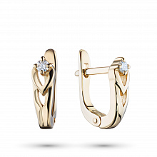 Keltakultainen korvakoru timanttikoru