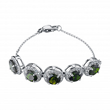 Valkokultainen rannekoru joissa on kromidiopsideja ja timanttikoru