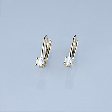 Keltakultainen korvakoru timanttikoru