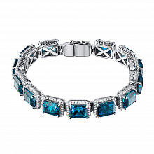 Rannekoru timanttikoru ja topaasin kanssa