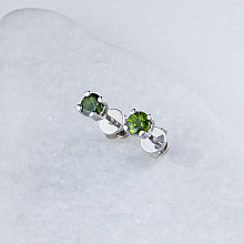 Hopeinen pysetit joissa on kromidiopsideja