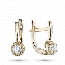 Keltakultainen korvakoru timanttikoru