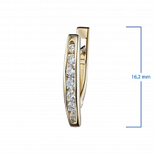 Keltakultainen korvakoru timanttikoru