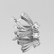 Valkokultainen korvakoru timanttikoru